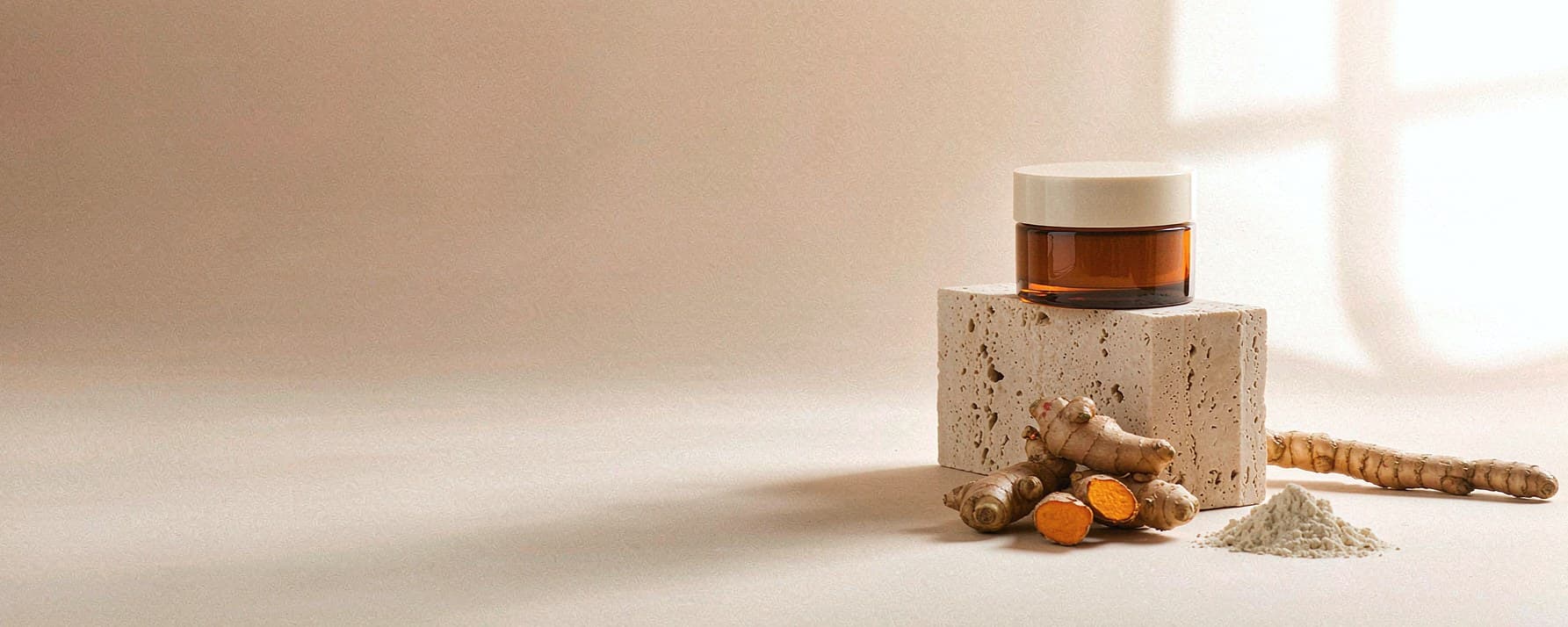 Kojic acid + turmeric skincare concept image